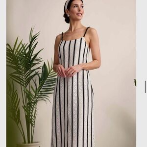 Elegant Black and White Striped Dress with beaded straps